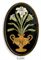 A PAIR OF ITALIAN PIETRA DURE OVAL PANELS