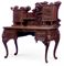 A SOUTH EAST ASIAN CARVED HARDWOOD DESK