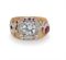 A GOLD, DIAMOND AND RUBY RING  