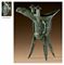 A BRONZE RITUAL TRIPOD WINE VESSEL,