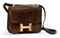 A BROWN CROCODILE 'CONSTANCE' BAG  