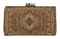 AN EMBROIDERED CLUTCH BAG  
