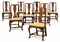 AN ASSEMBLED SET OF EIGHT QUEEN ANNE WALNUT