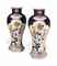 A PAIR OF JAPANESE IMARI BALUSTER VASES