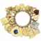 A GOLD AND MULTI-GEM CHARM BRACELET  