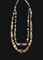 A WESTERN ASIATIC BANDED AGATE AND GOLD