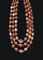 A WESTERN ASIATIC CARNELIAN AND AGATE BEAD