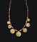 A WESTERN ASIATIC GOLD AND STONE BEAD