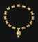 SIXTEEN SOUTH ARABIAN GOLD BEADS  