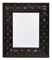 A BRASS BUTTONED-DOWN LEATHER FRAMED MIRROR