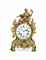 A LOUIS XV ORMOLU MANTEL CLOCK  