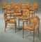 'RENDEZ-VOUS DES PÊCHEURS DE TRUITES' A SET OF THIRTEEN CHAIRS,