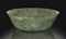 A TRANSLUCENT GREEN JADE BOWL  