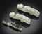THREE SMALL JADE GARMENT HOOKS  