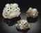 THREE SMALL JADE RAM CARVINGS  