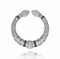 AN ART DECO RUBY AND DIAMOND BANGLE, BY