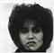 Puerto Rican woman with a beauty mark,
