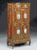 A Napoleon III ormolu and Sevres-style turquoise-ground porcelain-mounted rosewood side cabinet 
