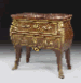 A Regence style ormolu-mounted kingwood and parquetry commode en tombeau 