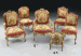 A Continental Rococo style parcel-gilt and cream-painted music holder  