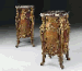 An important pair of Louis XV style ormolu-mounted kingwood, mahogany and end-cut marquetry pedestal bedside cabinets 