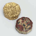 A TALISMANIC QUR'AN IN A GOLD CASE  