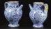 A set of two Marchegian maiolica berettino-ground syrup jars  