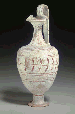 A GREEK POTTERY TREFOIL OINOCHOE  