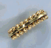 A RETRO GOLD BANGLE BRACELET, BY CARTIER  
