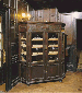 A STAINED OAK CORNER HUMIDOR CABINET  
