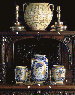 A PAIR OF ITALIAN MAIOLICA SQUAT CYLINDRICAL ALBARELLI  