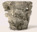 A FRAGMENTARY CARVED STONE CAPITAL  