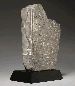 AN EGYPTIAN FRAGMENTARY GRAY LIMESTONE STATUE  