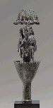 AN EGYPTIAN BRONZE HARPOKRATES ON A LOTUS  