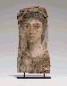 A PAINTED WOOD MUMMY PORTRAIT OF A WOMAN  