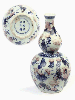 A Chinese copper-red and underglaze blue double gourd vase, Kangxi six-character mark and of the period 