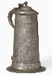 A GEORGE I PEWTER SPIRE FLAGON  
