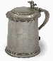 A FINE ENGLISH PEWTER FLAT-LID TANKARD  