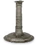AN UNUSUAL ENGLISH PEWTER TRUMPET-BASE CANDLESTICK  