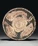 A CANOSAN RED FIGURE FISH PLATE ATTRIBUTED TO THE EYEBROW PAINTER  