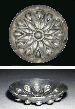 AN ACHAEMENID REPOUSSÉ SILVER PHIALE MESOMPHALOS  