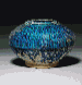 A KASHAN TURQUOISE GLAZED KASHKUL  