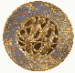 A pierced parcel-gilt enamelled roundel of two fantastical beasts  