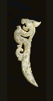 A FINELY CARVED GREENISH-WHITE JADE DRAGON PENDANT  