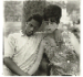 Young man and his pregnant wife in Washington Square Park, N.Y.C. 1965  