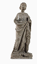 A CARVED STONE FIGURE OF A FEMALE SAINT  