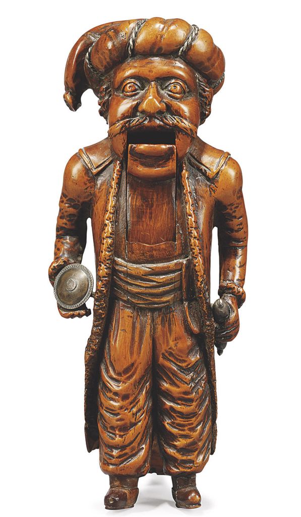 A GERMAN SILVERMOUNTED BOXWOOD LEVER ACTION NUTCRACKER , EARLY 17TH