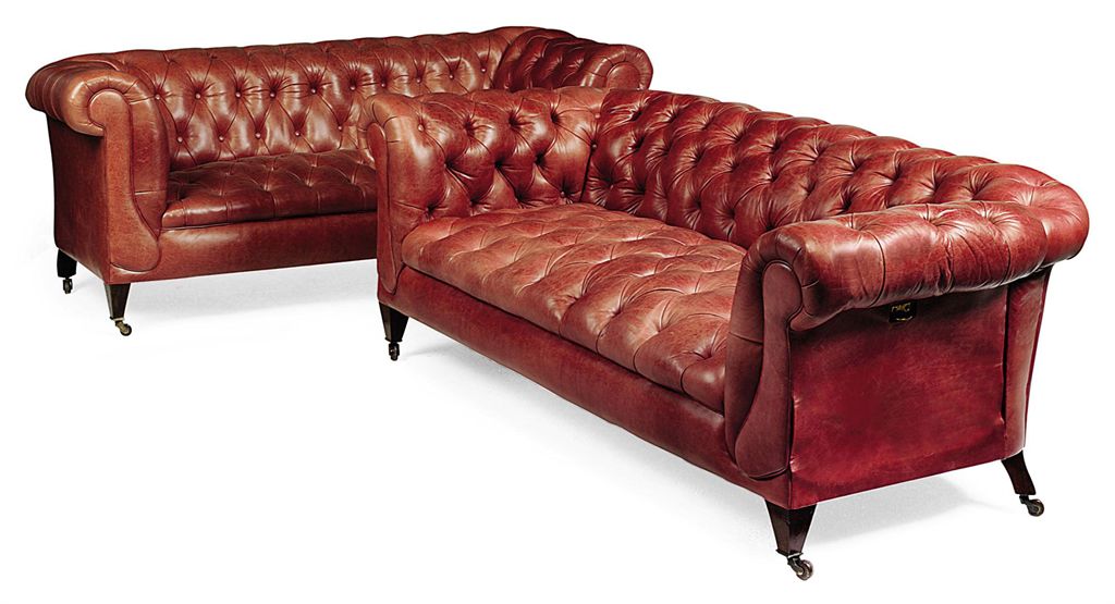A NEAR PAIR OF EDWARDIAN MAHOGANY CHESTERFIELD SOFAS , PROBABLY J A S SHOOLBRED, EARLY 20TH A NEAR PAIR OF EDWARDIAN MAHOGANY CHESTERFIELD SOFAS , PROBABLY J A S SHOOLBRED, EARLY 20TH
