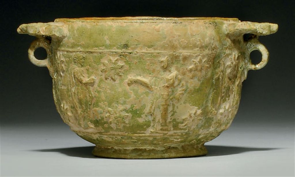 A ROMAN LEAD GLAZED POTTERY SKYPHOS , CIRCA 1ST CENTURY B.C./A.D