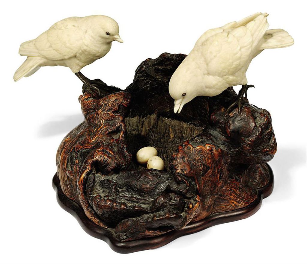 A Japanese Ivory And Wood Okimono Sculptural Ornament